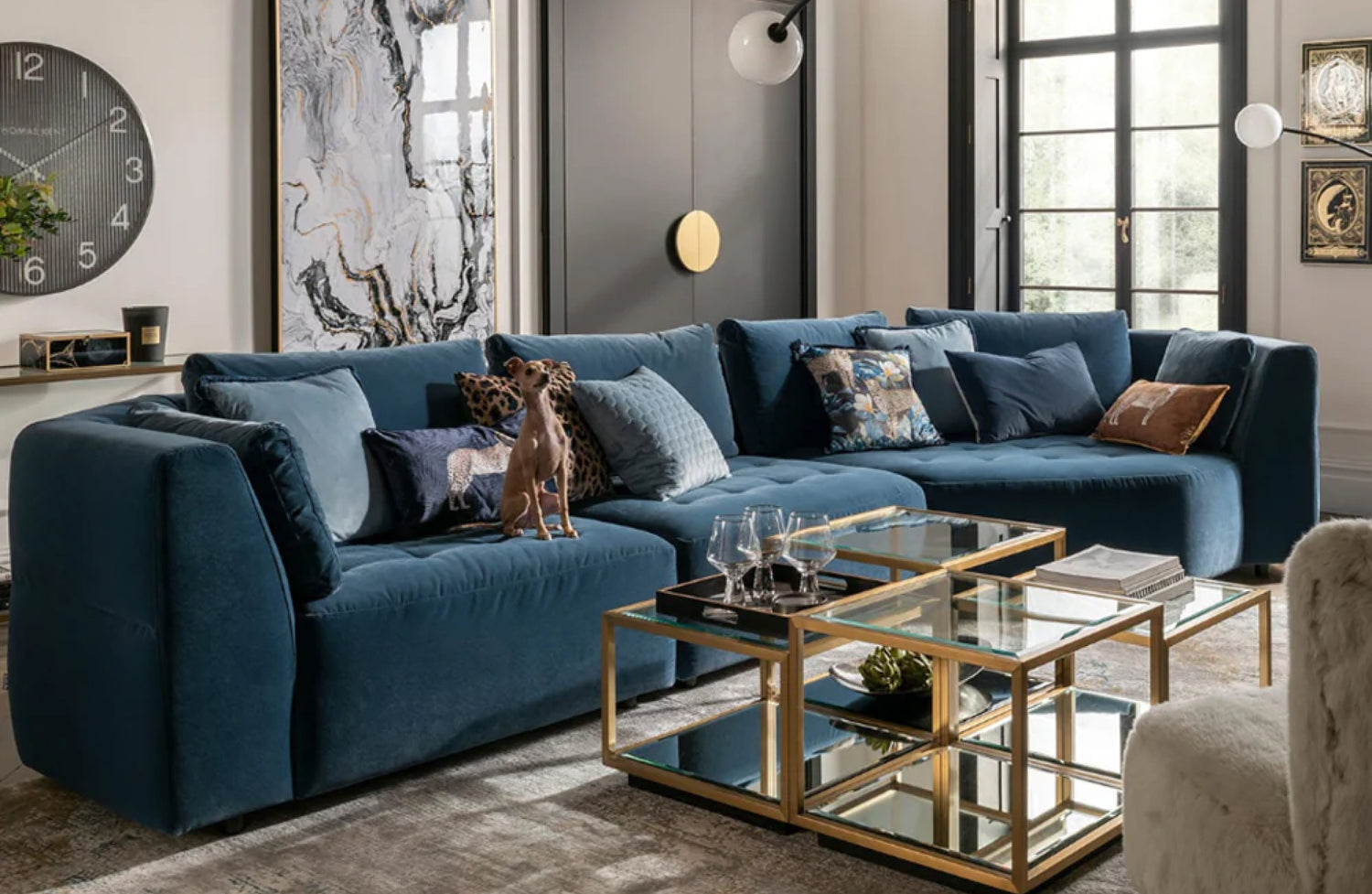 decorating around a navy blue sofa